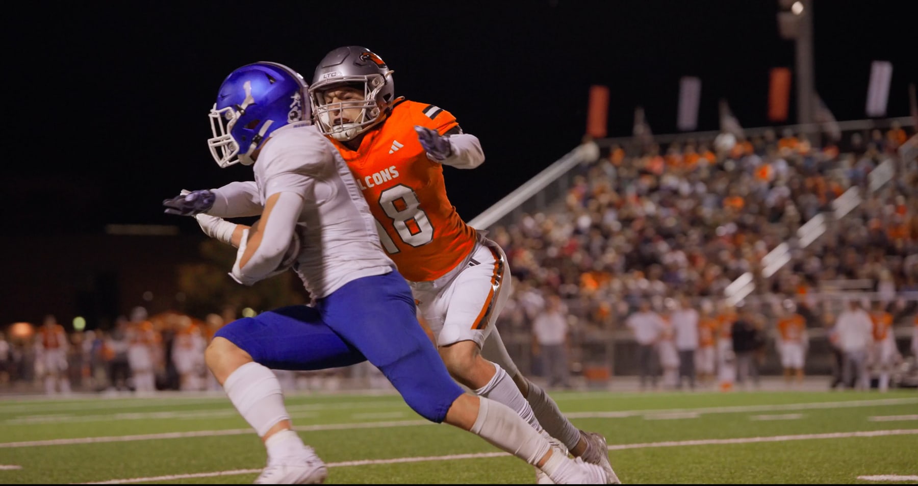 Porter Logan defending a play during a Skyridge football game